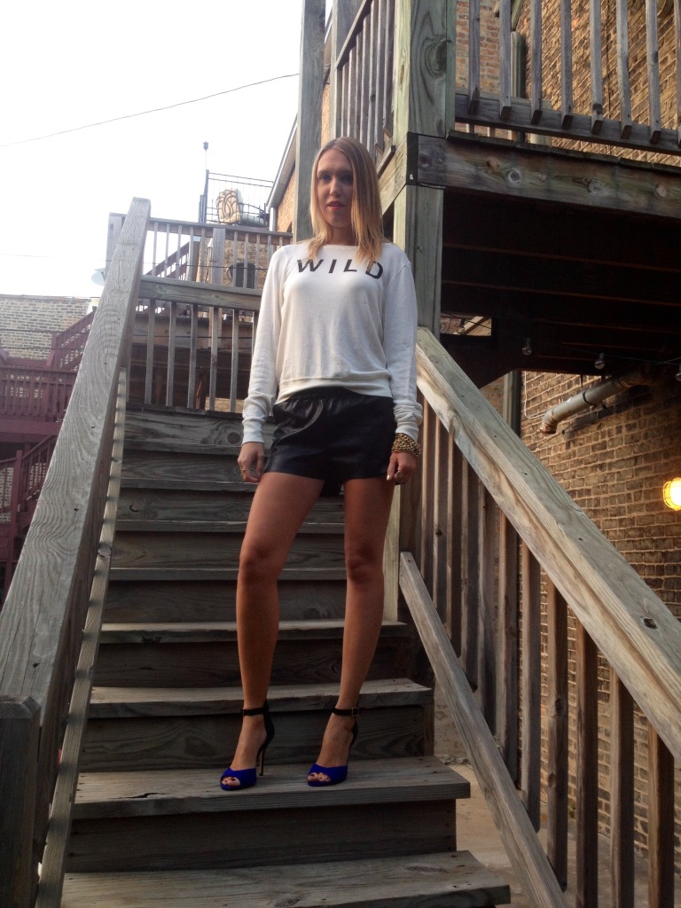 Sweatshirt: Wildfox; Shorts: H&M; Shoes: Steve Madden.