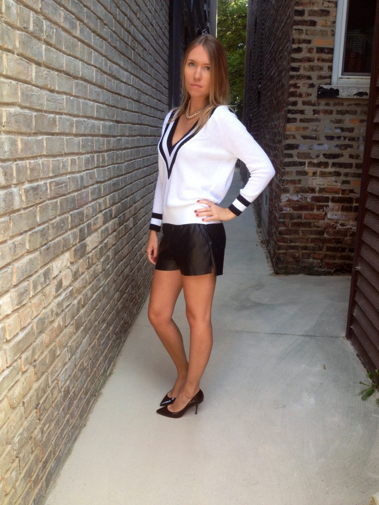 Sweater: Nasty Gal; Shorts: H&M; Shoes: Louboutin.